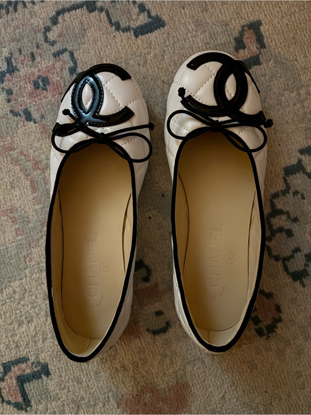 CHANEL White Quilted Leather Ballet Flats with Black CC Trim